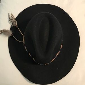 Black hat with feathers