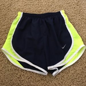 Navy and yellow Nike shorts