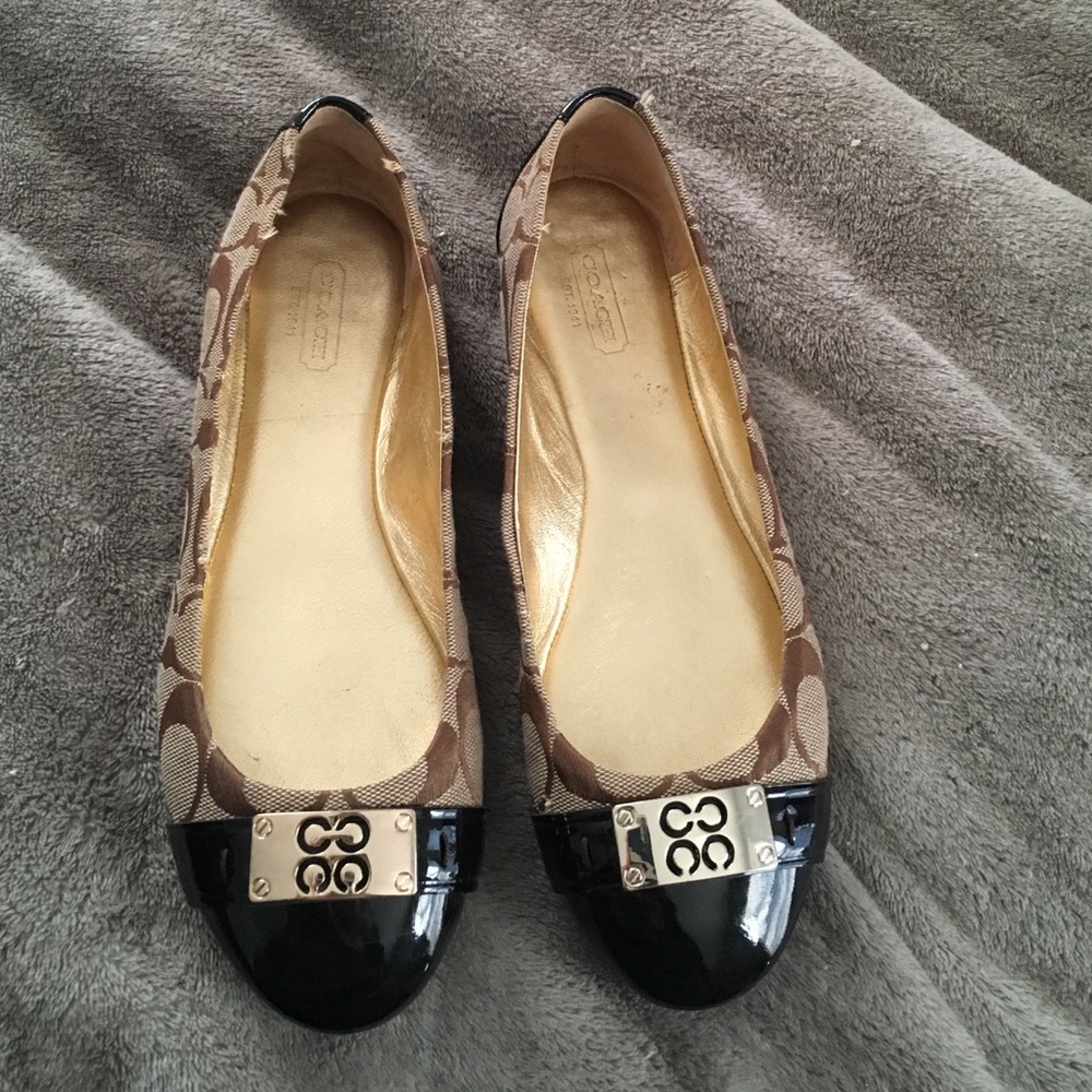 Brown coach flats