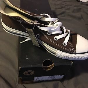 Brown high top chucks