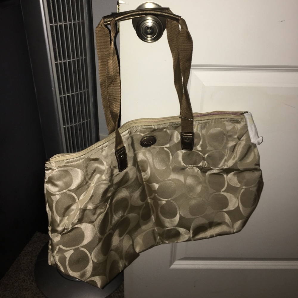 Coach tote bag with small insert bag.