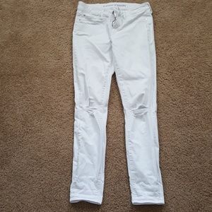 Size 28 white distressed knee denim