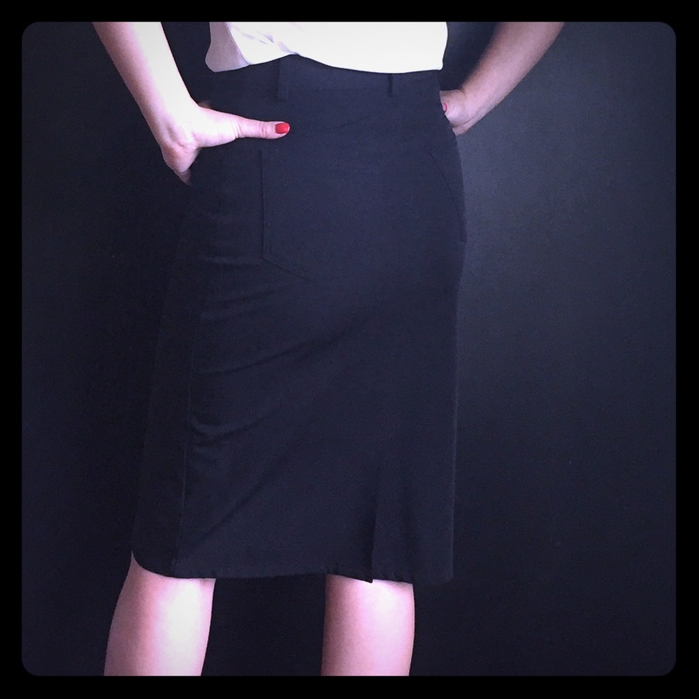 Black denim cut skirt.