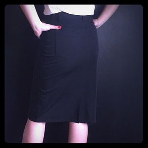 Black denim cut skirt.
