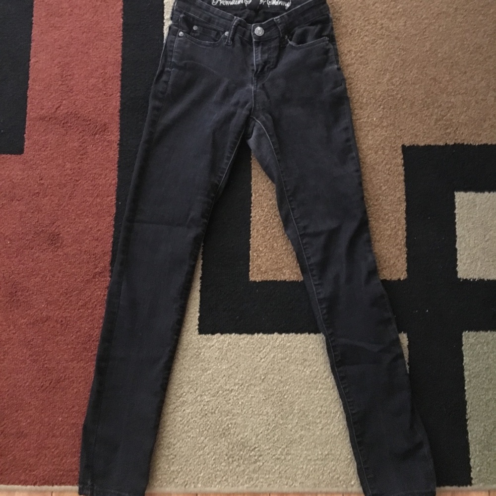 Faded black skinny jeans.