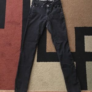 Faded black skinny jeans.