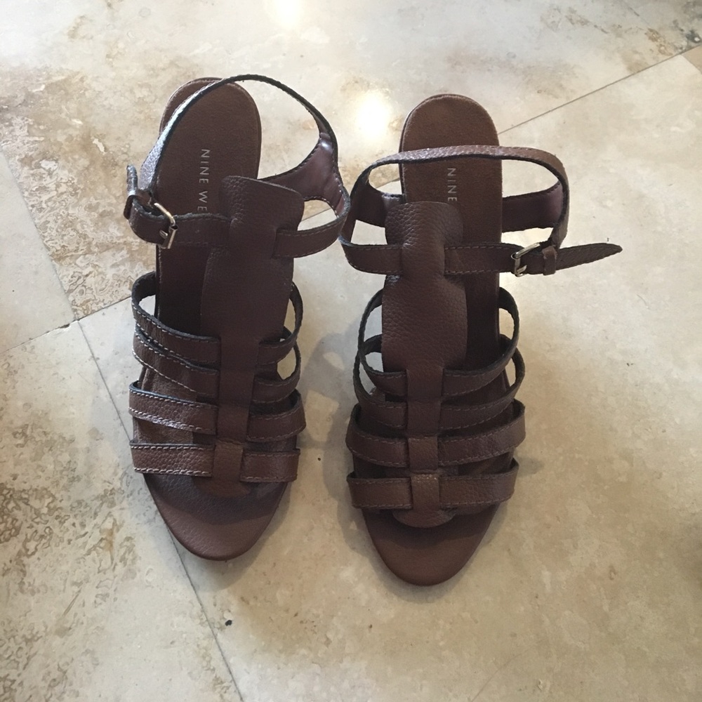 Nine West brown platforms.