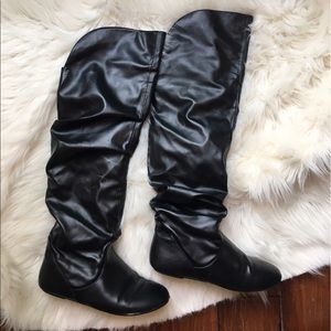 Black thigh high boots