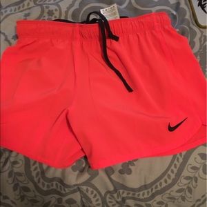 NIKE SHORTS WITH BUILT IN SPANDEX