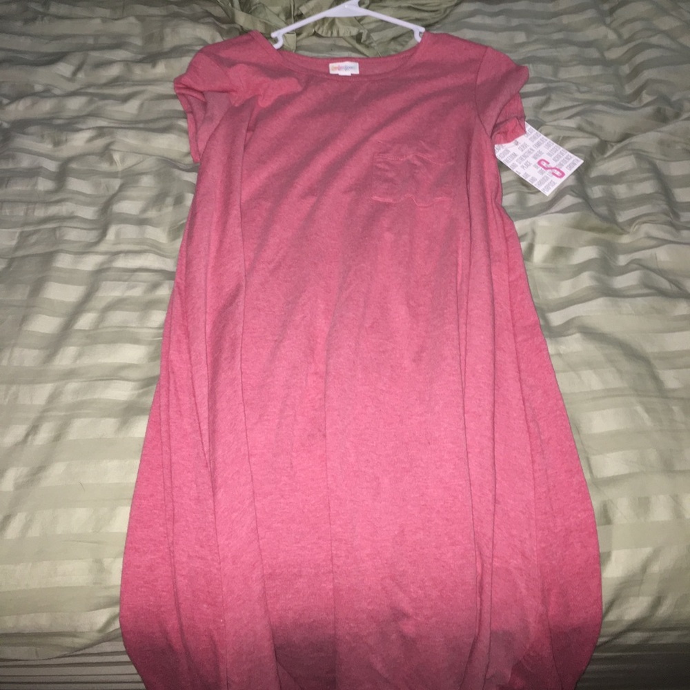 Pink Carly. Never worn. Small.