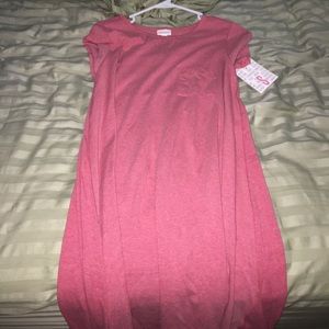 Pink Carly. Never worn. Small.