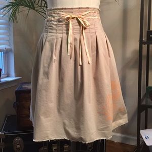 Tan a-line skirt w/ribbon and flower detail