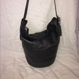 Coach black bucket bag with studs