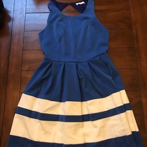 Blue dress with pleated skirt