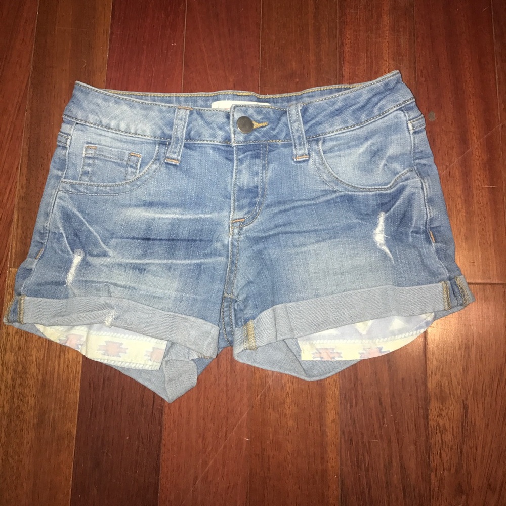 jean shorts with colorful pockets