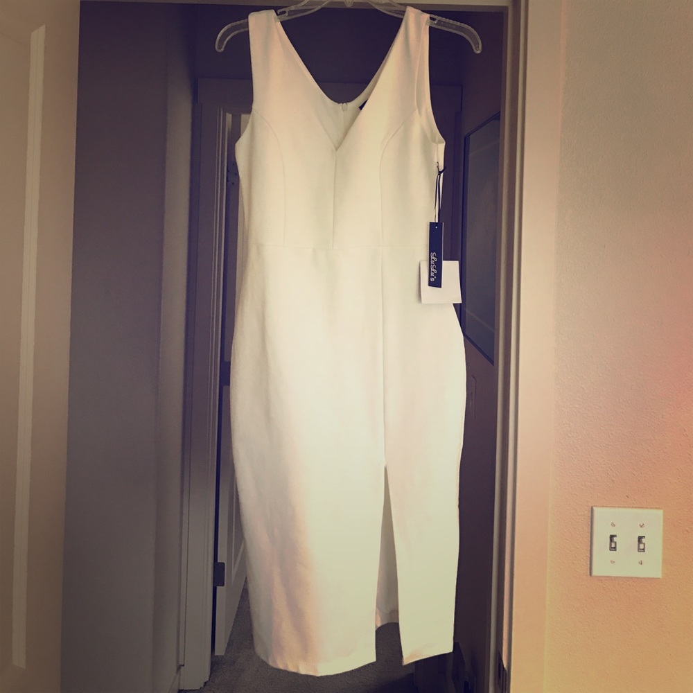 Little white dress with slit in the front!