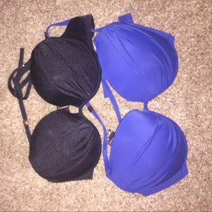 Two VSX swimsuit tops