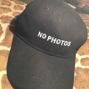 Black dad hat. "No Photos" Never worn.