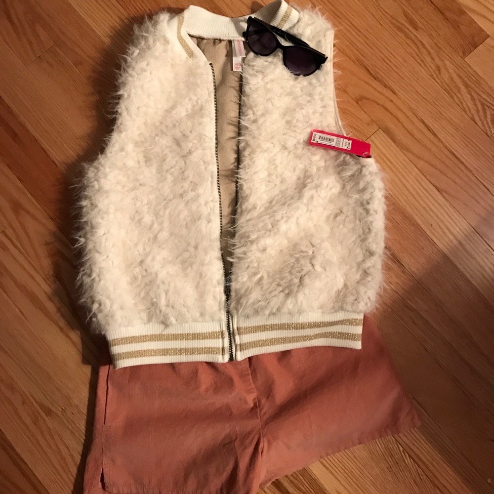 White fluffy fur vest