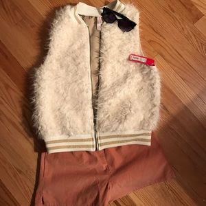 White fluffy fur vest
