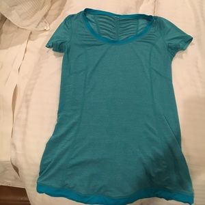 Lululemon teal green workout top.