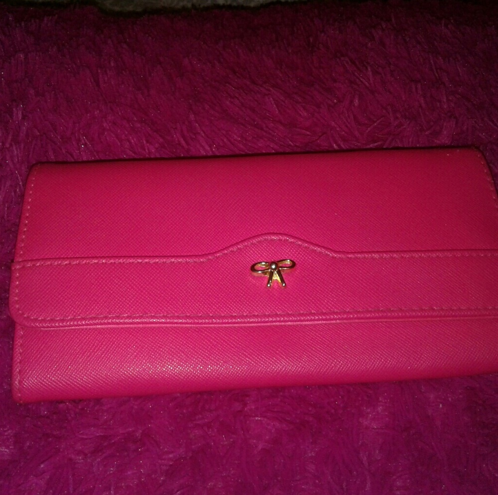 Pink wallet with bow