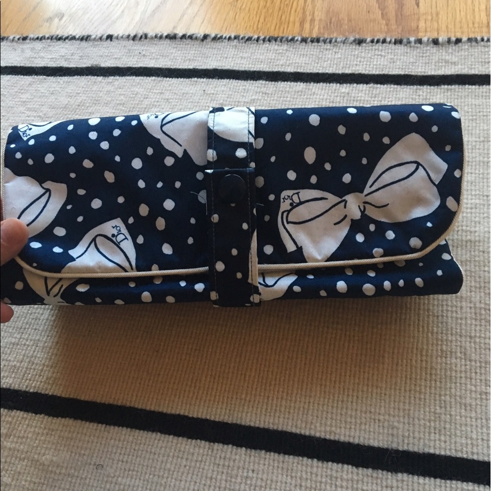 Christian Dior makeup bag.