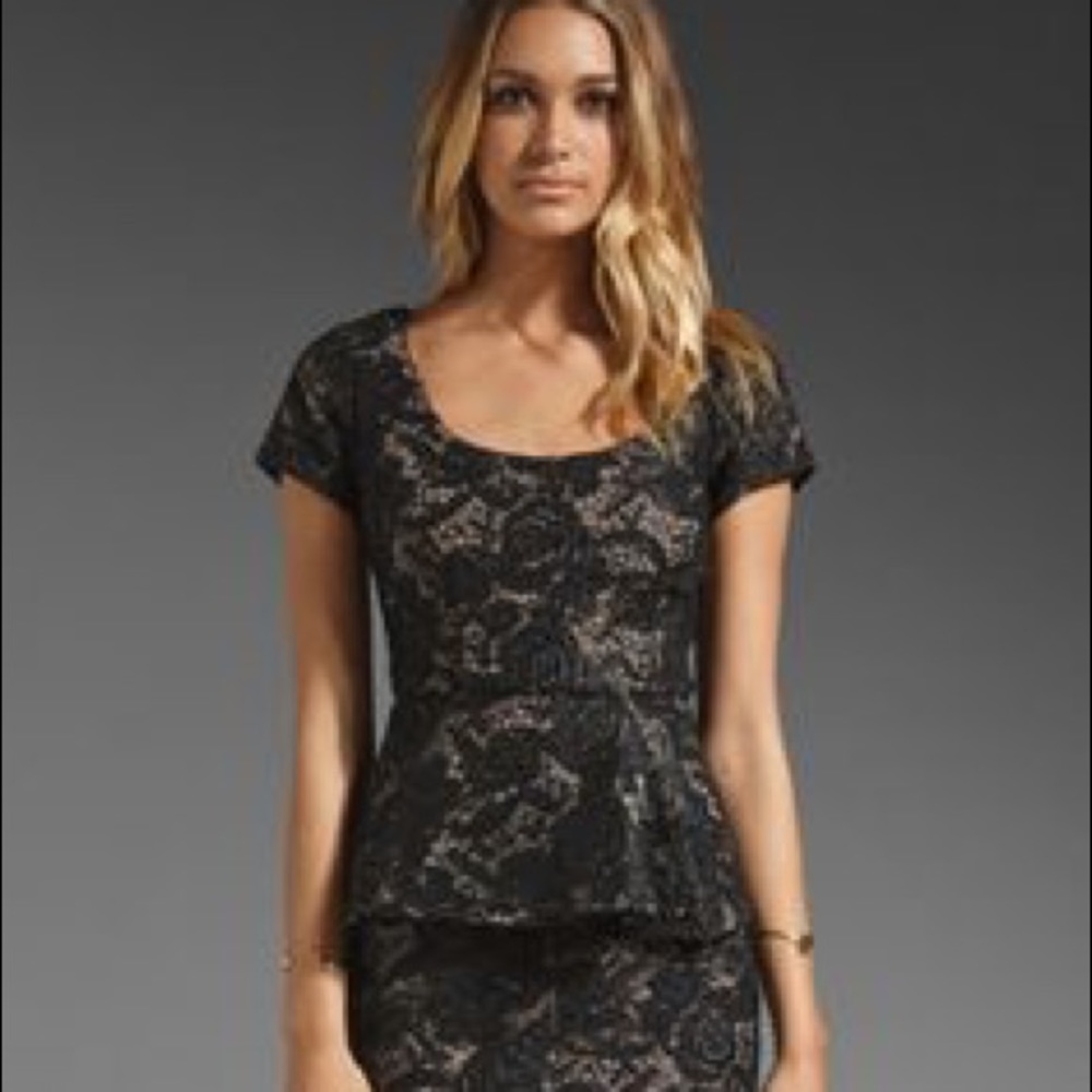 Tracy Reese lace peplum dress in black.