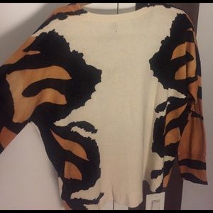 A Tiger sweater by Minkpink size small.