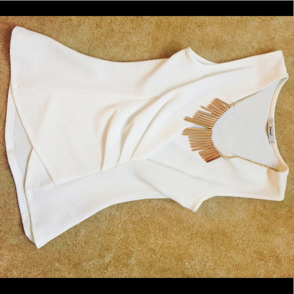 White sleeveless top