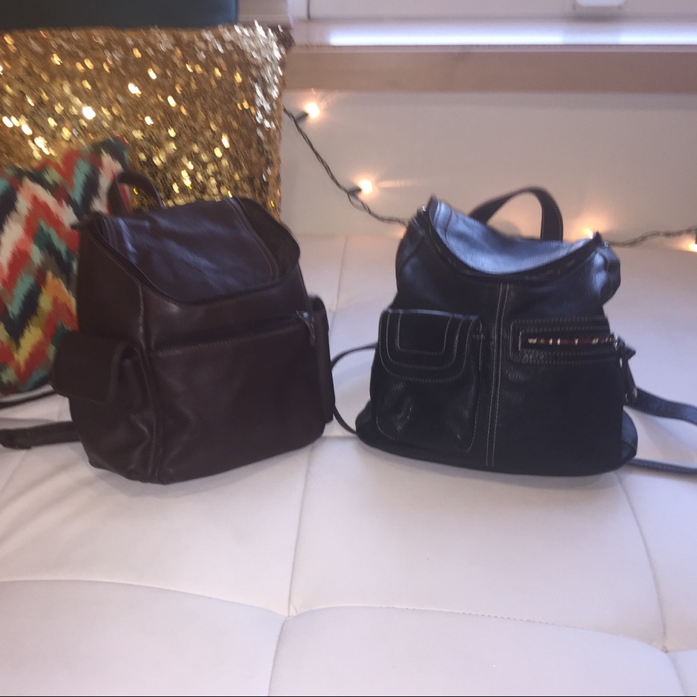 Black and Brown leather back packs. Like new.