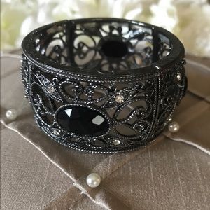 Black and silver with stones bracket