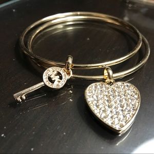 Gold bangle bracelets with key heart charms Kors
