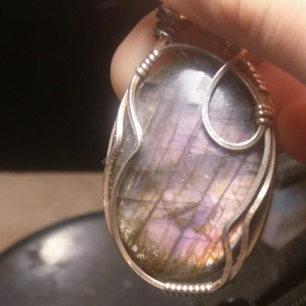 Stunning purple and orange labradorite pendant