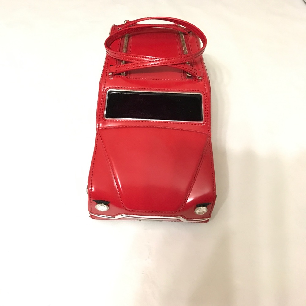 Kate spade rose colored glasses red car clutch