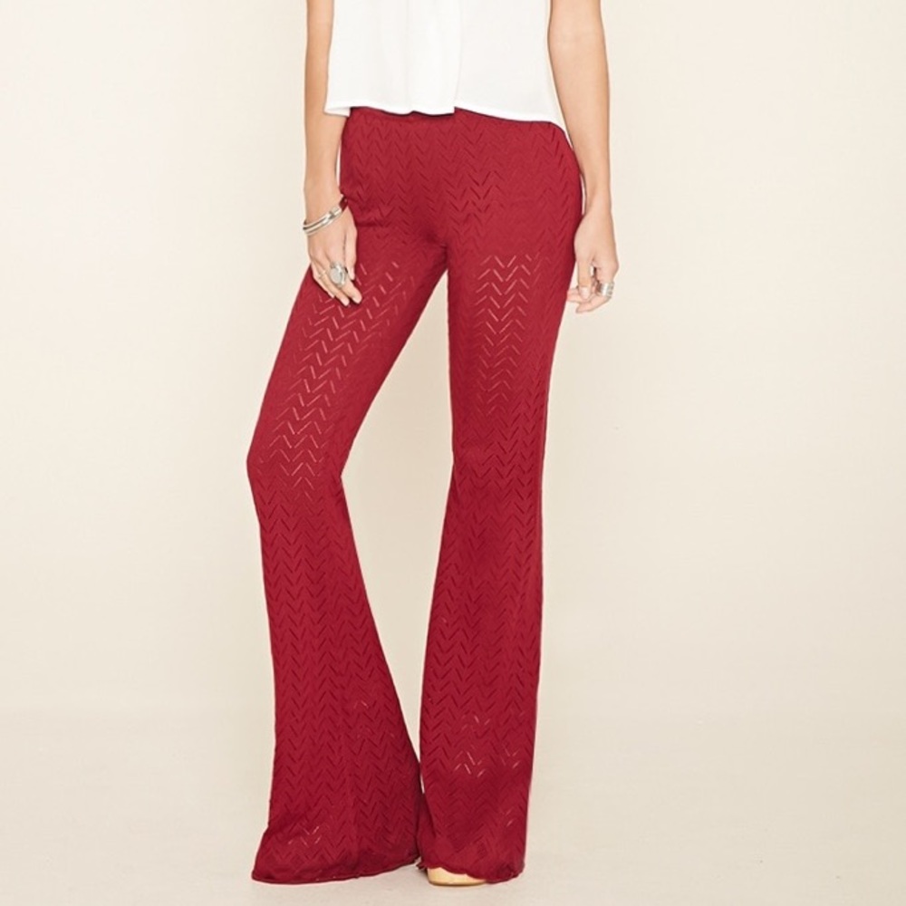 Perforated red zigzag pants