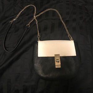 Small black and white purse