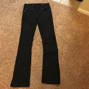 La idol black large stitch jeans.
