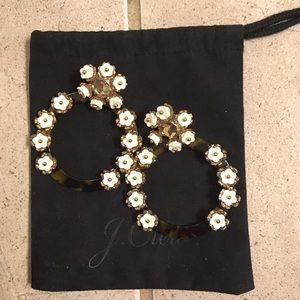 J crew floral hoop earrings with a bag