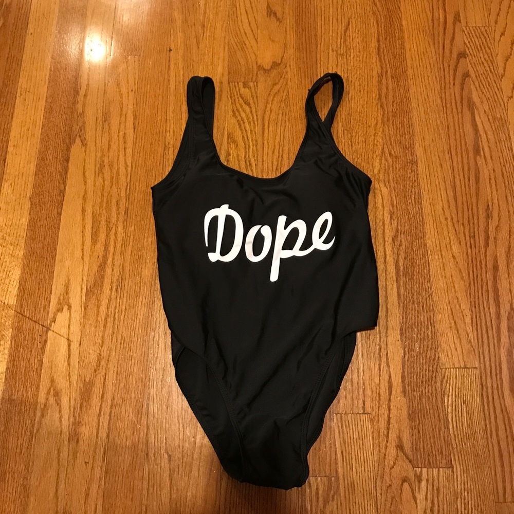 A one piece black bathing suit.