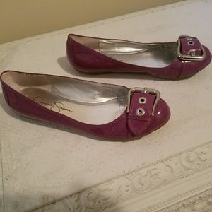 Patent leather ballerina flats.