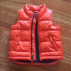 Orange puffer vest