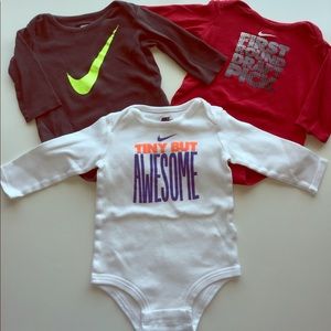 3 baby Nike onesies