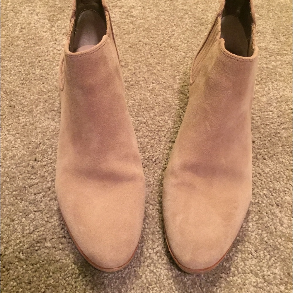 Beige Michael Kors booties.