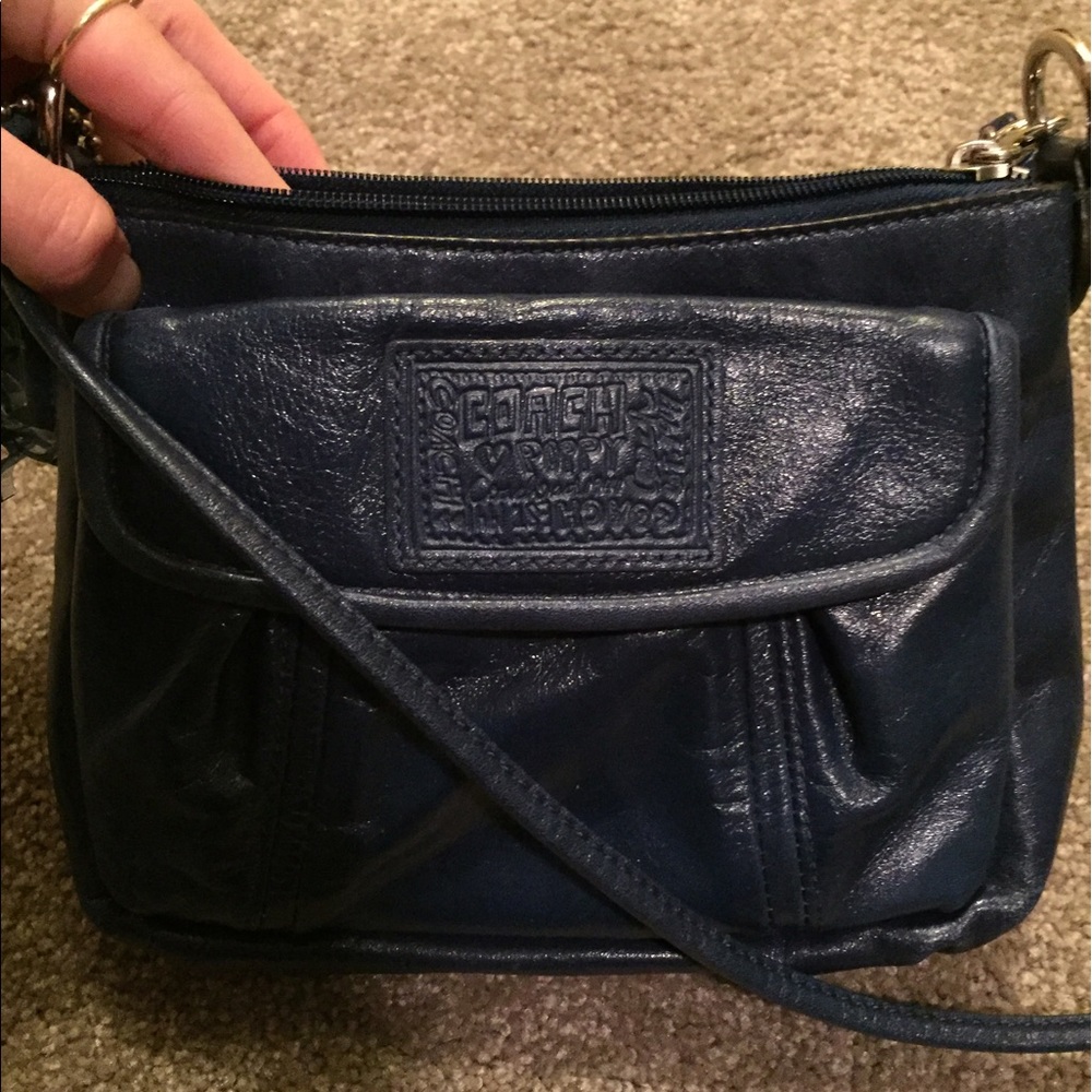 Navy coach poppy purse