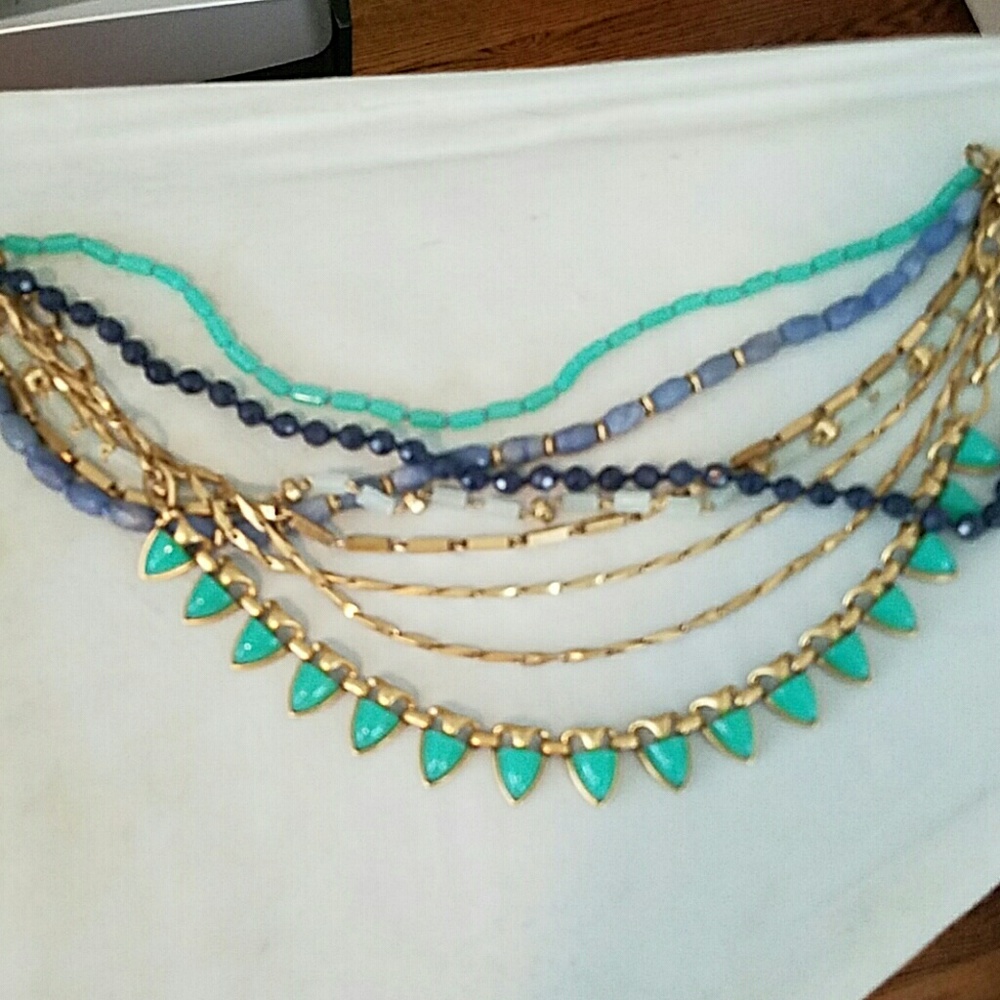 Multi strand gold green and blue necklace