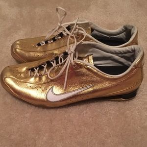 Gold Nike Track Shoes