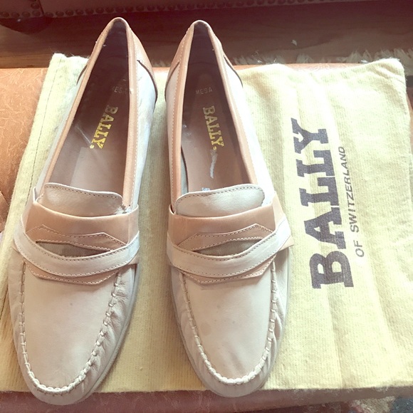 Peach and tan colored men\'s  Bally shoes.