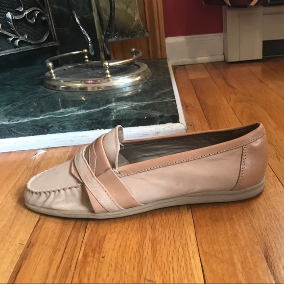 Peach and tan colored men\'s  Bally shoes.