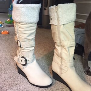 Cream colored knee high boots